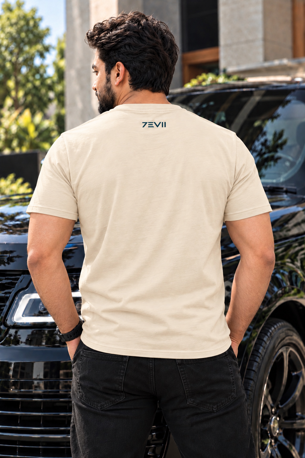 Irf wearing 7EVII calligraphy T-shirt in Beige, back view