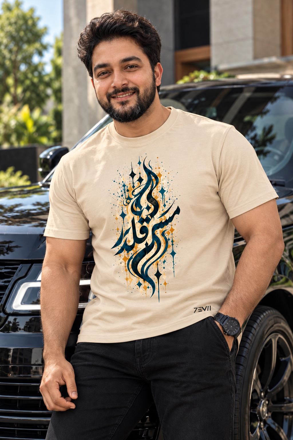 Irf wearing the 7EVII Urdu calligraphy T-shirt in Beige, front view