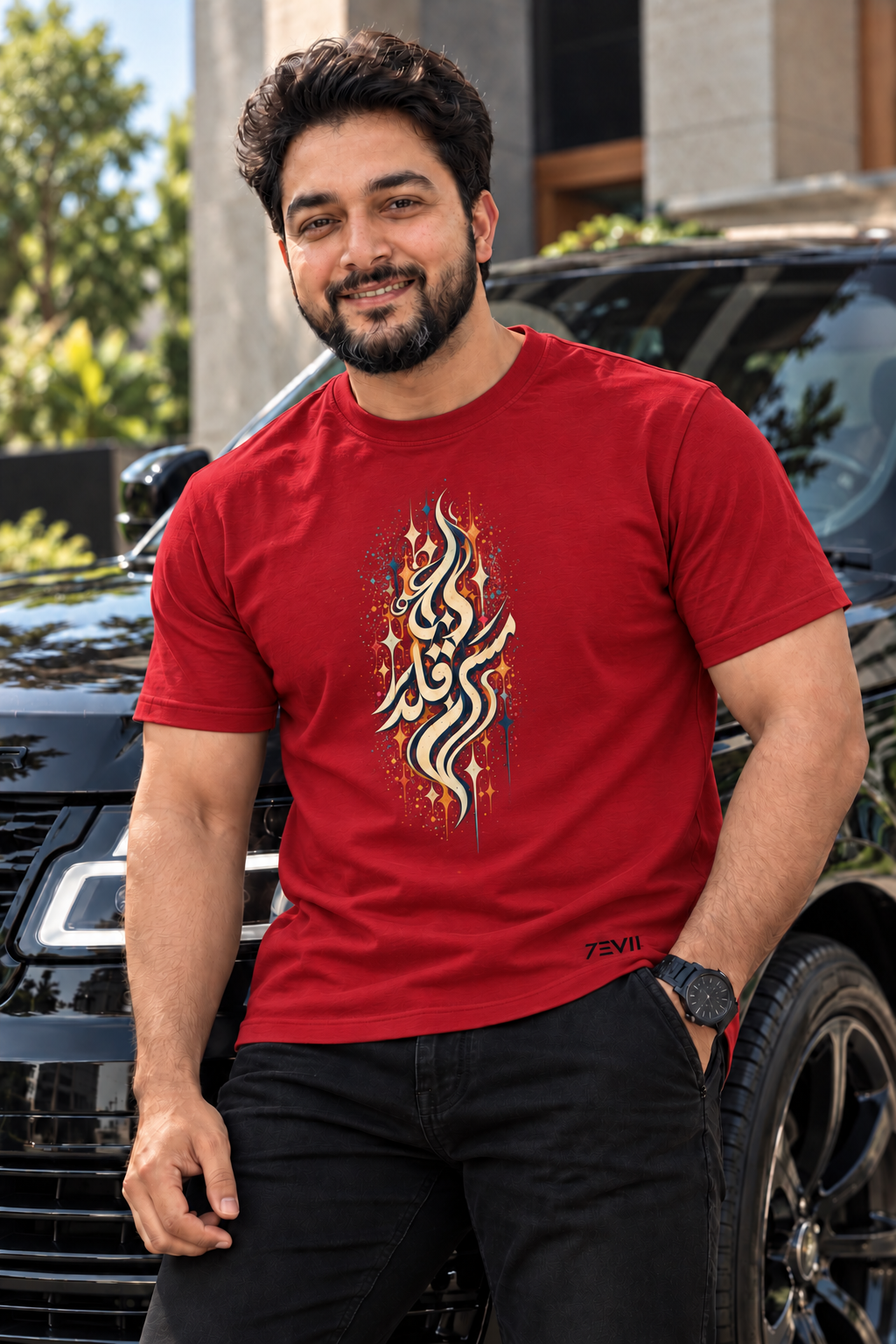 Irf wearing the 7EVII Urdu calligraphy T-shirt in Cardinal Red, front view