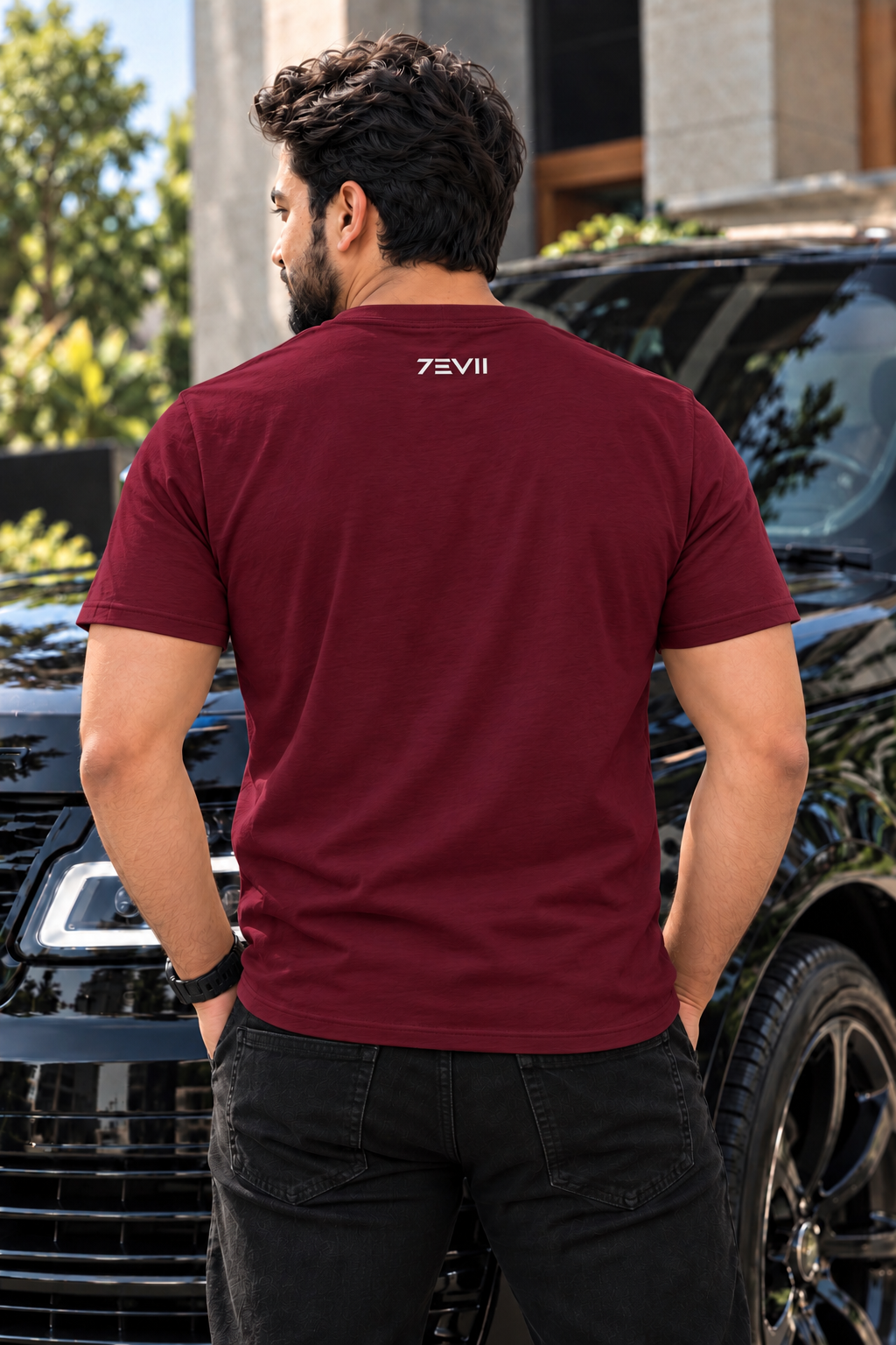 Irf wearing 7EVII calligraphy T-shirt in Maroon, back view