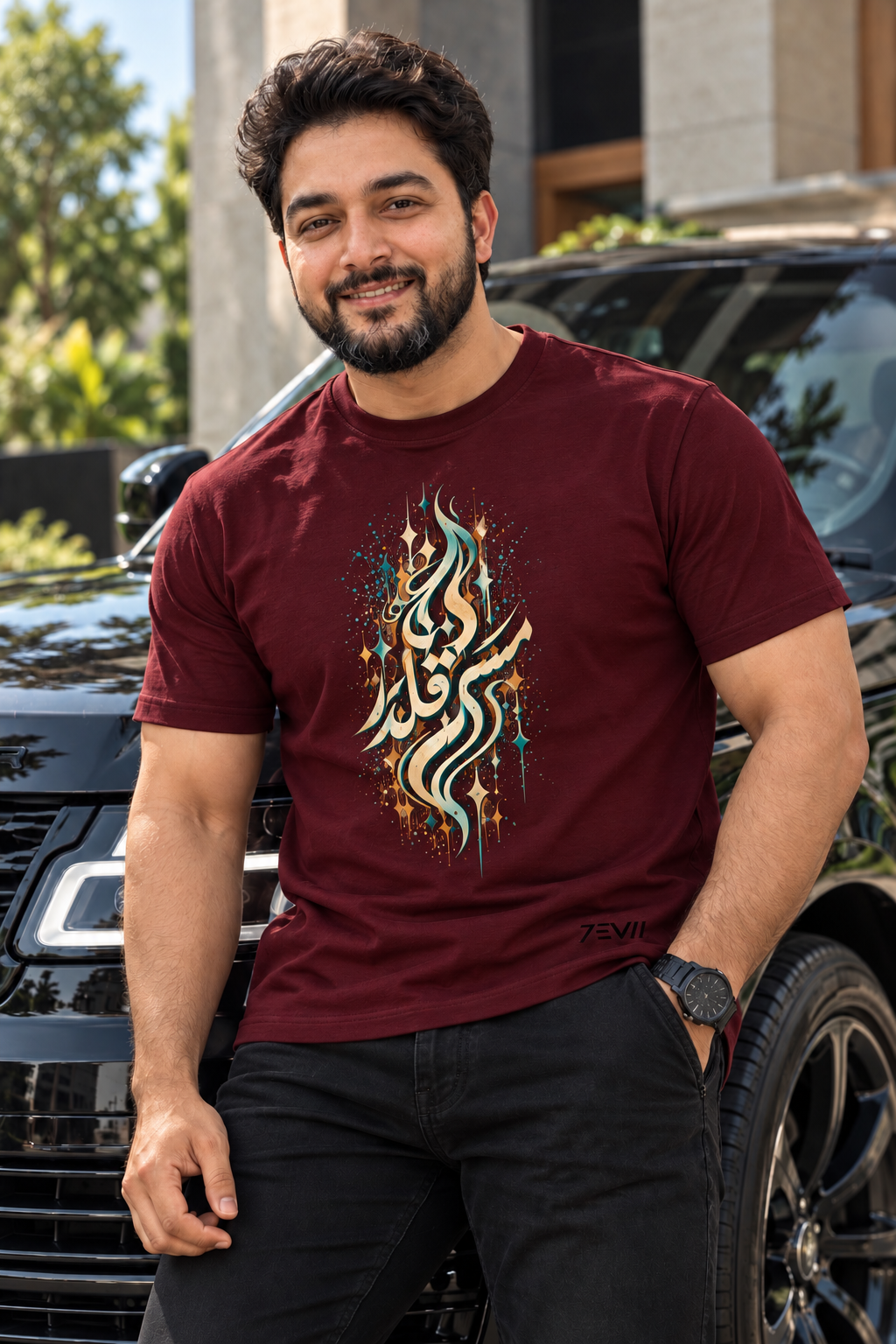Irf wearing the 7EVII Urdu calligraphy T-shirt in Maroon, front view